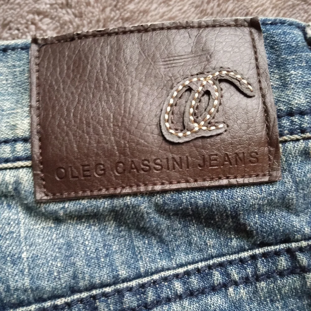 Oleg Cassini jeans with pocket embroidery